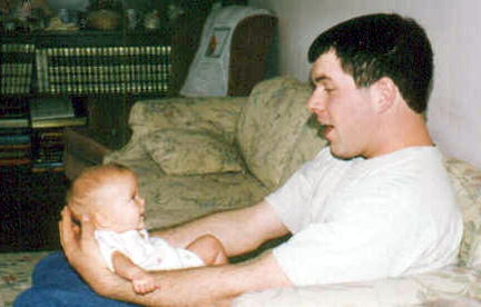 Young Man with Baby Girl